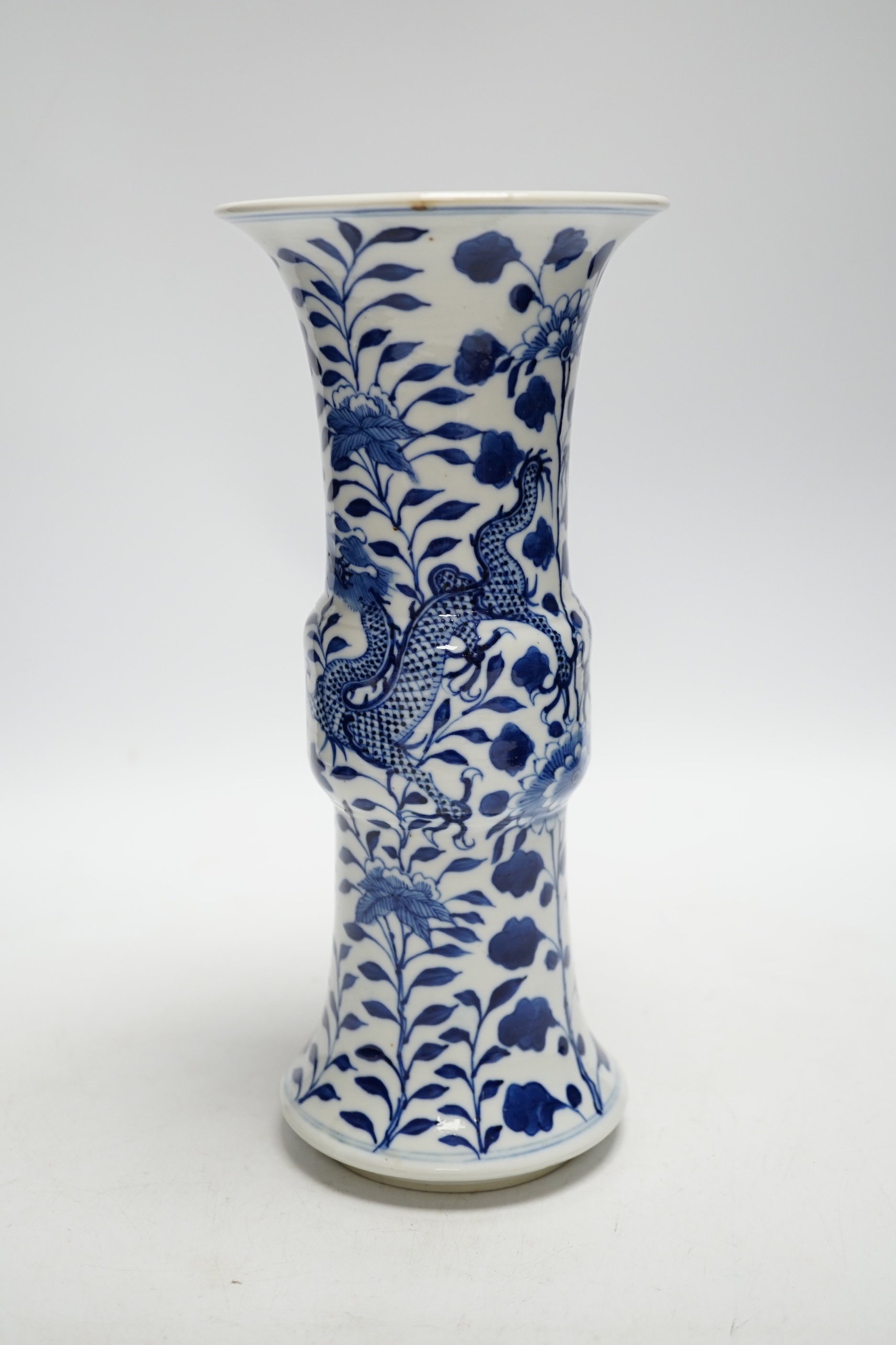 A late 19th century Chinese blue and white ‘dragon’ vase, 26cm